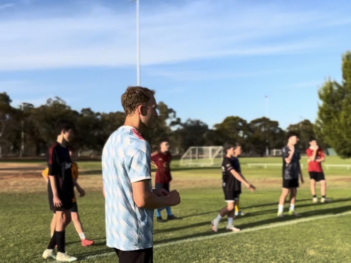 Riley Aunger coaching young players at Aunger Elite Football